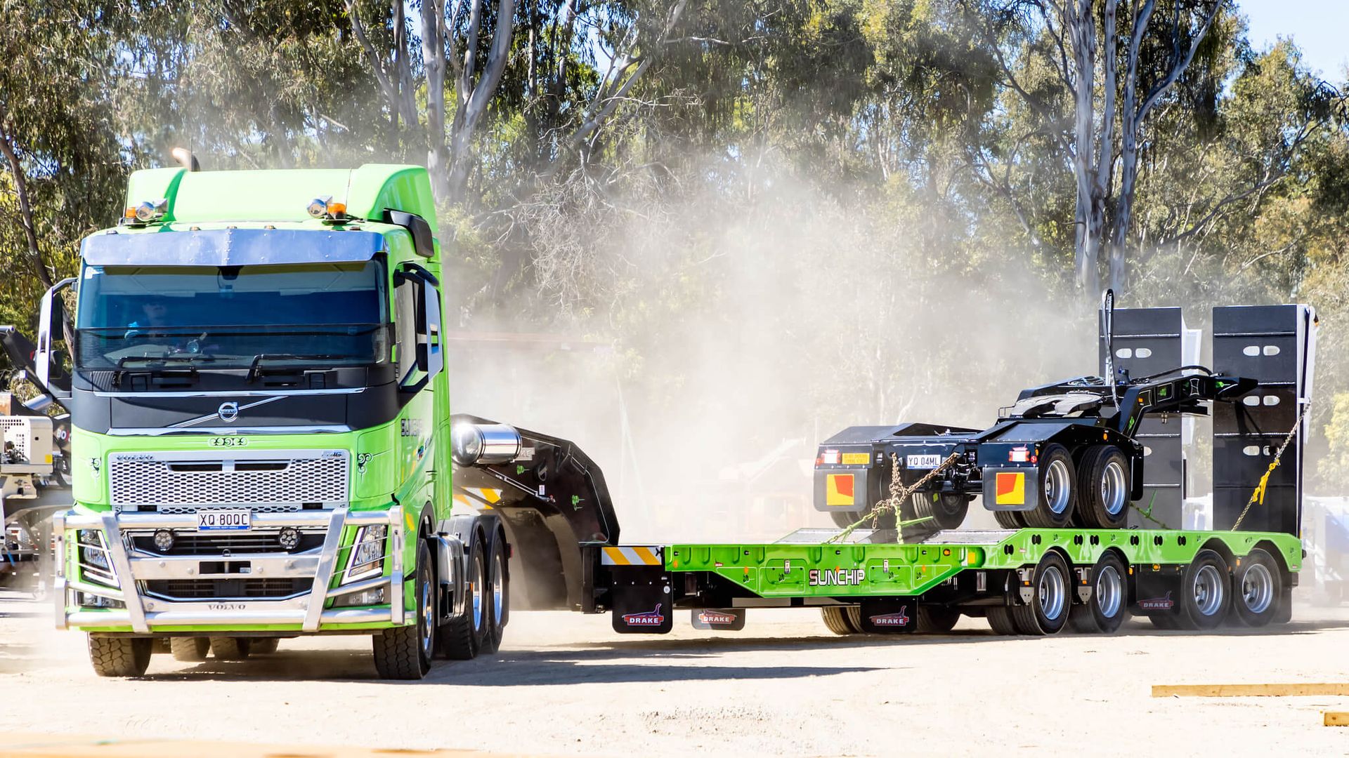 Sunchip Steering Widener and Dolly trailer - The Green Machine - kicking up dust out on the road
