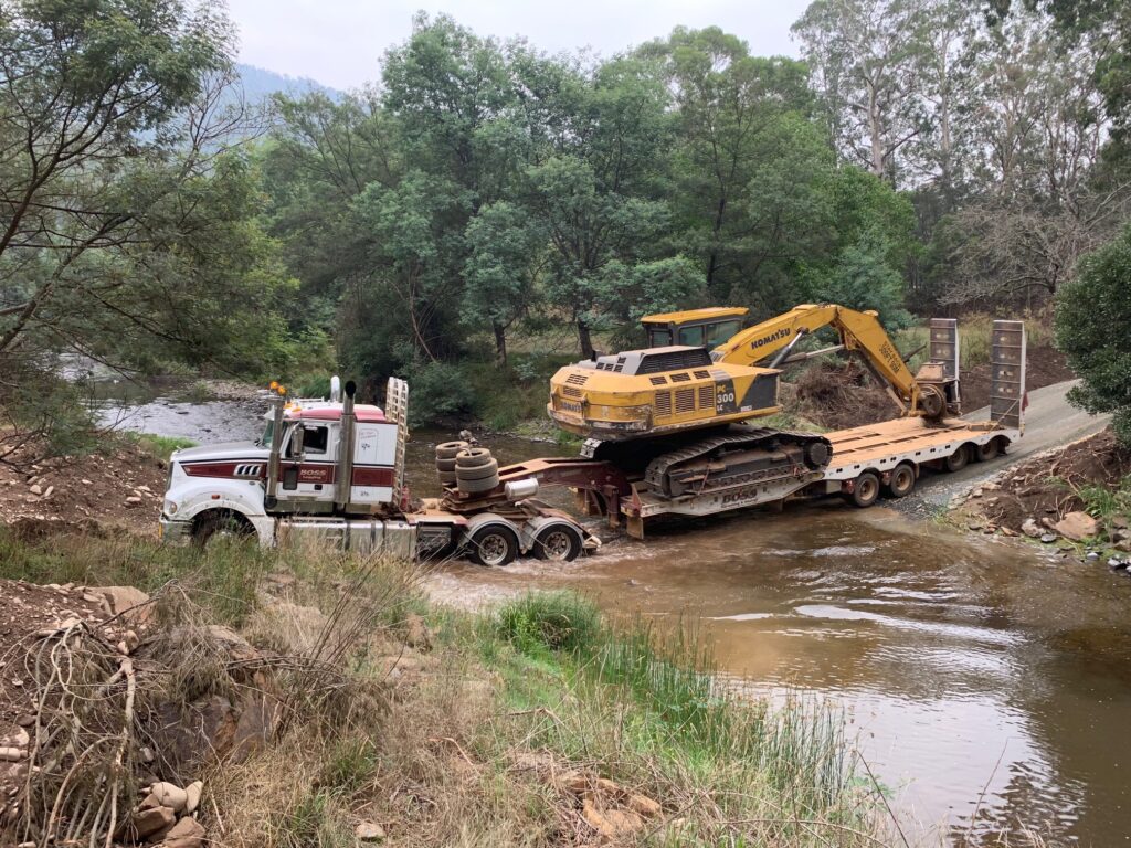 drake 4x4 steering widener going across the river
