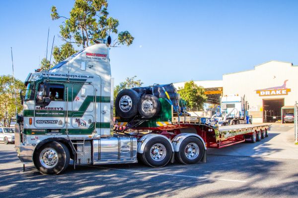 Towing a large vehicle? Try a Tilt Slide Trailer - Drake Group